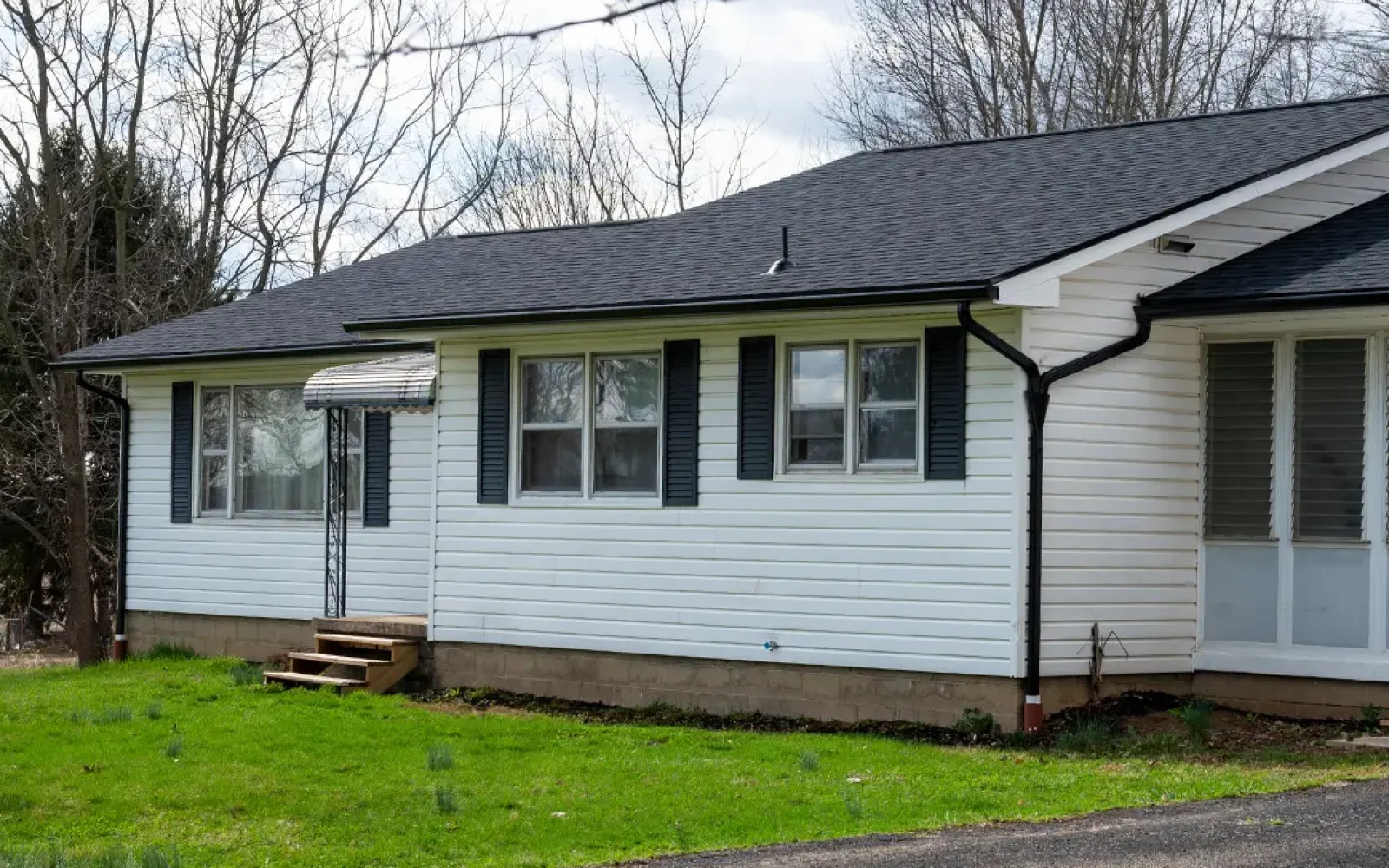 Completed asphalt shingle roof replacement on a residential home in Canal Winchester, OH by Able Roofing.